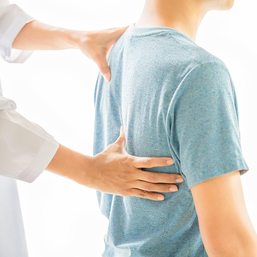 Physical therapists are examining the patient's body.