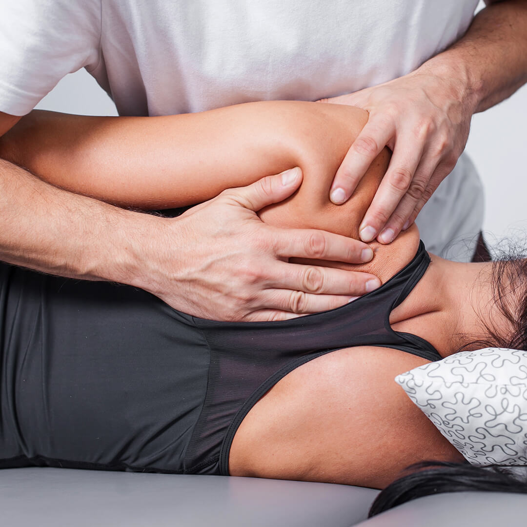 Body massage in spa. Physiotherapy back pain exercises.